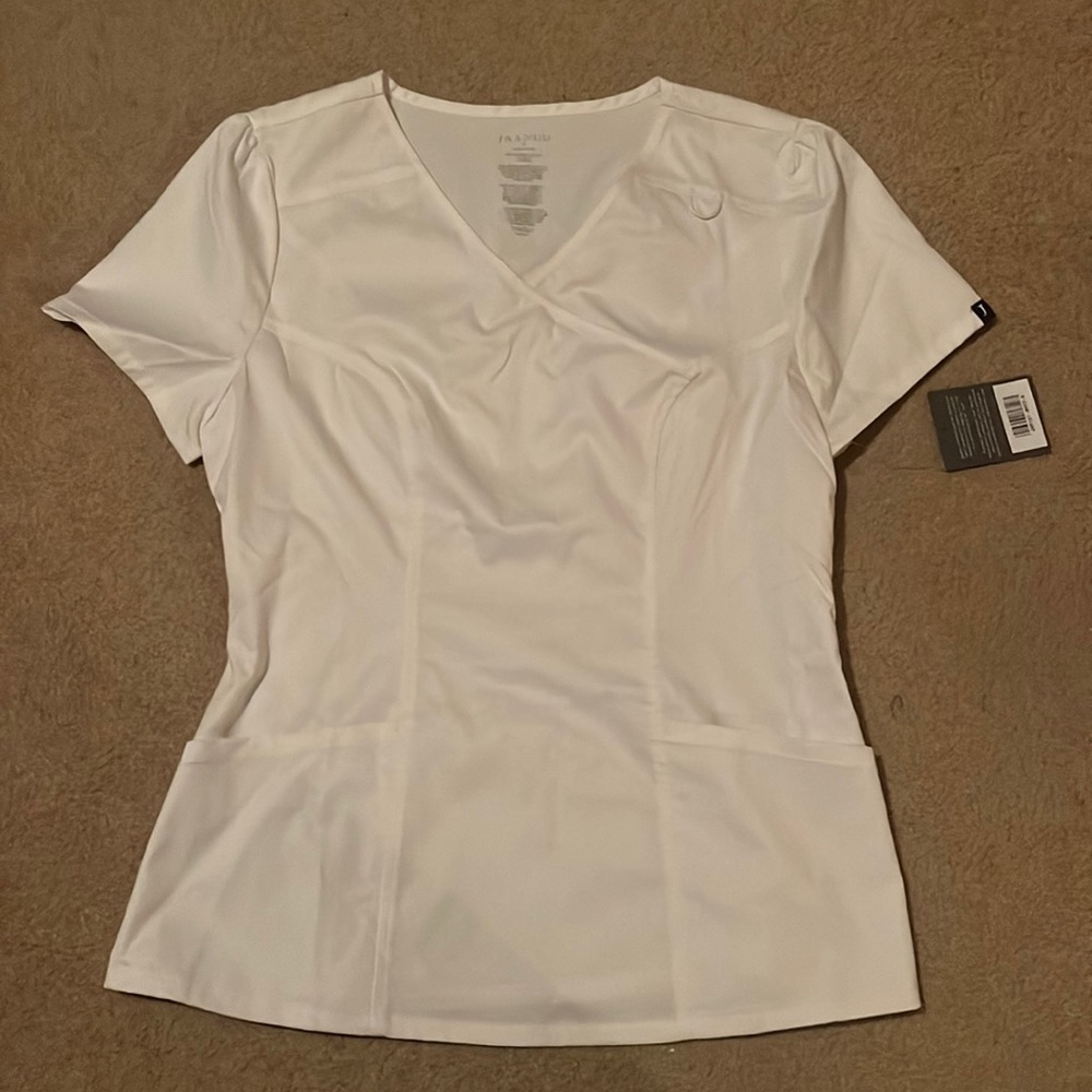 JAANUU scrub top! Brand new with tags! Old school style never worn didn’t fit me